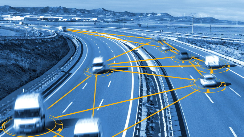 A network of Vans driving on the interstate