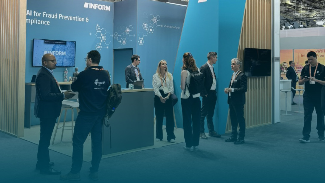 Our INFORM experts at the booth of RiskShield, the hybrid AI solution for fraud prevention and AML compliance