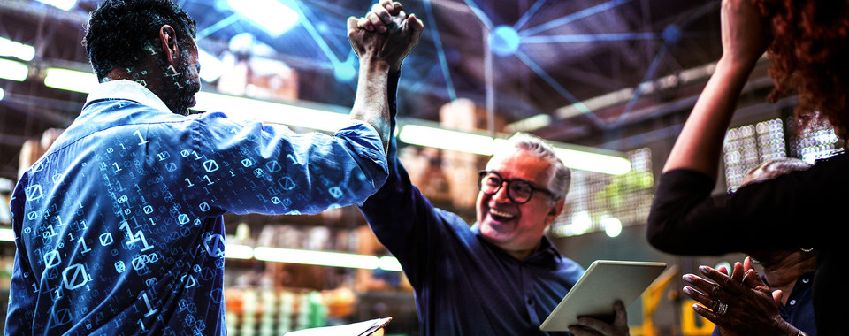 brate success in a modern warehouse with digital elements and tablets in hand.