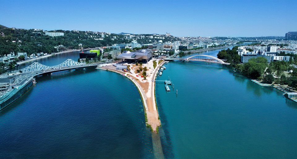 Confluence of the Rhône and Saône rivers in Lyon, symbolizing FRAML, the fusion of fraud prevention and AML.