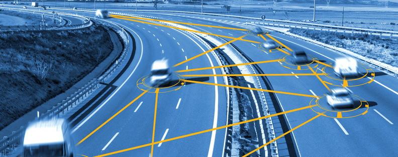 A network of Vans driving on the interstate