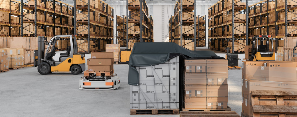 Busy warehouse interior with stacked boxes, pallets, and forklifts for efficient logistics operations.